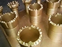 Anchoring Casing Bits